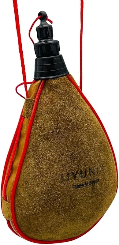Visita la tienda de UYUNIX Bota de Vino de Piel 1L, En Cuero Marrón Vacuno Con Interior de Látex Antigoteo, Conserva Cualquier Bebida, Botas De Vino Tradicionales para Fiestas, Toros, Caza y Camping — Vino y mesa festiva