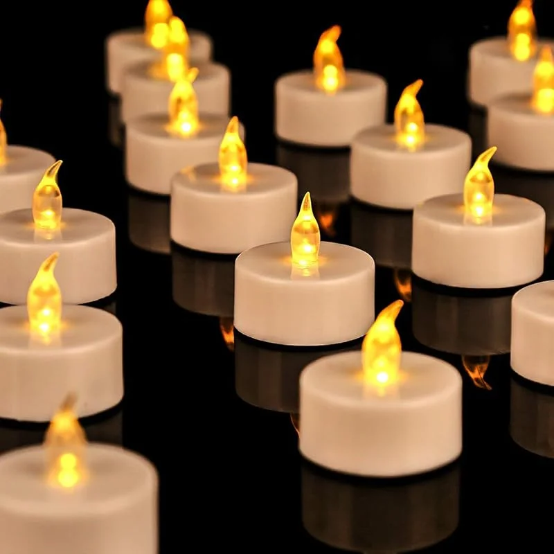 Visita la tienda de OSHINE OSHINE Velas de Té LED Sin Llama 12 Unidades Parpadeantes Luz Ámbar Cálida — Cena a la luz de velas