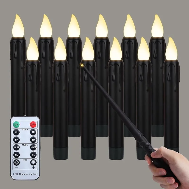 Visita la tienda de FREEPOWER FREEPOWER Juego de 12 velas LED flotantes en negro con varita mágica - Mando a distancia y temporizador - Parpadeo blanco cálido - Velas de 17 cm alimentadas por baterías - Impermeable para exteriores — Luces Navidad