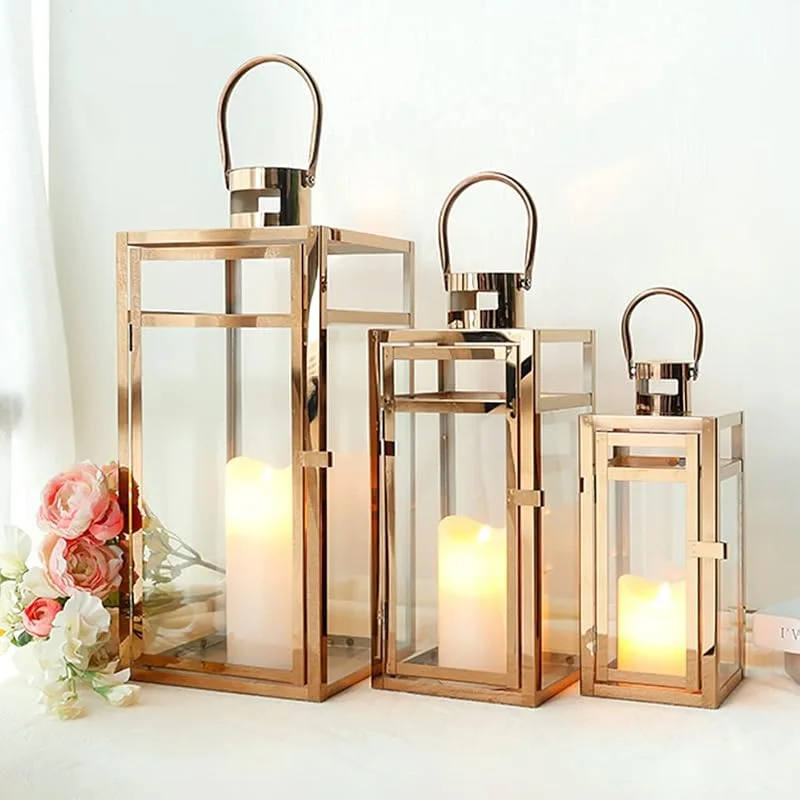TRIROCKS Set de 3 Faroles de Acero Inoxidable 48, 38, 30 cm Altos, Soportes de Vela con Vidrio Transparente para Decoración de Sala, Fiestas y Eventos (Oro Rosa) — Cena a la luz de velas